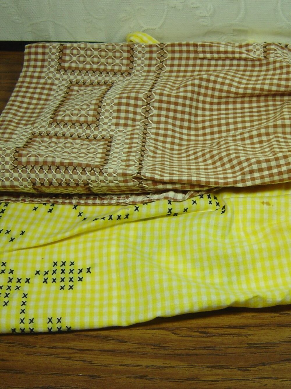 2 vintage embroidered gingham half aprons- "as is" condition-selling as cutters